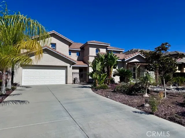 a view of a house with a street