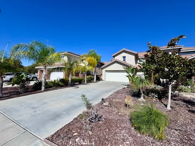 a view of a house with a street