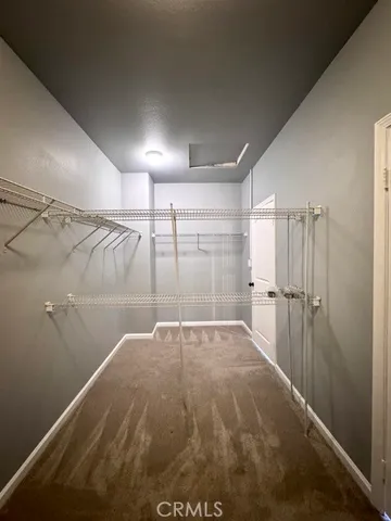 a bathroom with a glass door shower