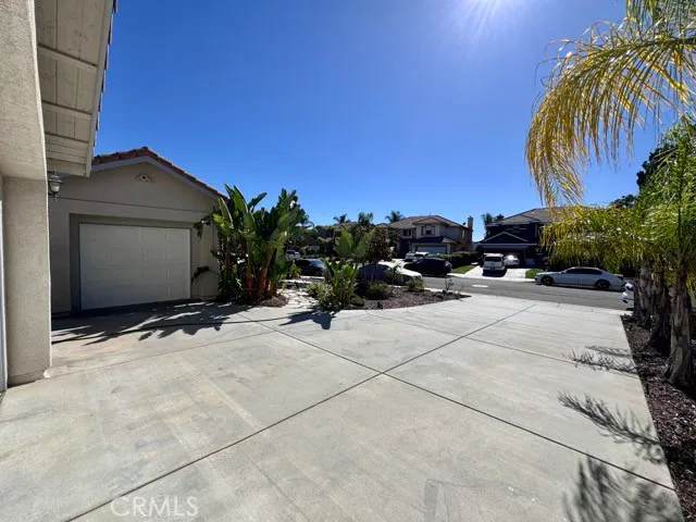 a view of a house with a street