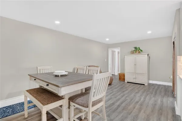 a workspace with furniture and wooden floor