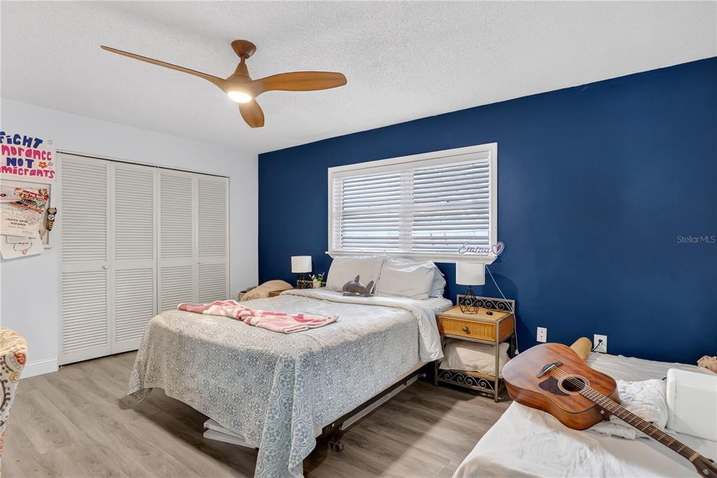 4222 Old Dominion Road Orlando, FL 32812 - Photo 19 of 49 a bedroom with a bed and a window