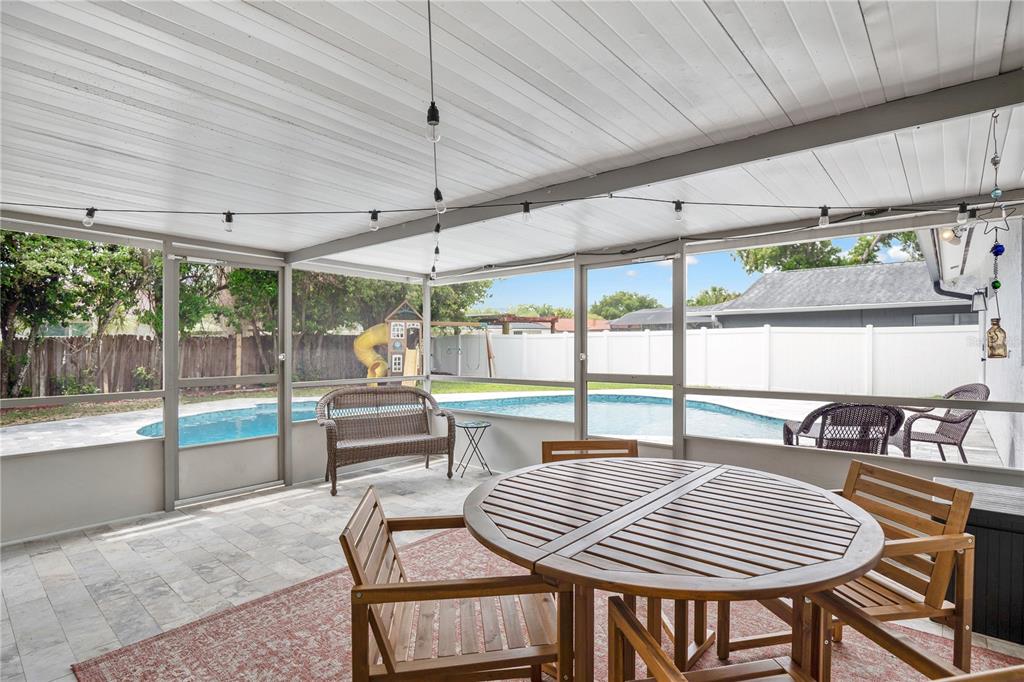 4222 Old Dominion Road Orlando, FL 32812 - Photo 27 of 49 a outdoor space with patio the couches and chairs