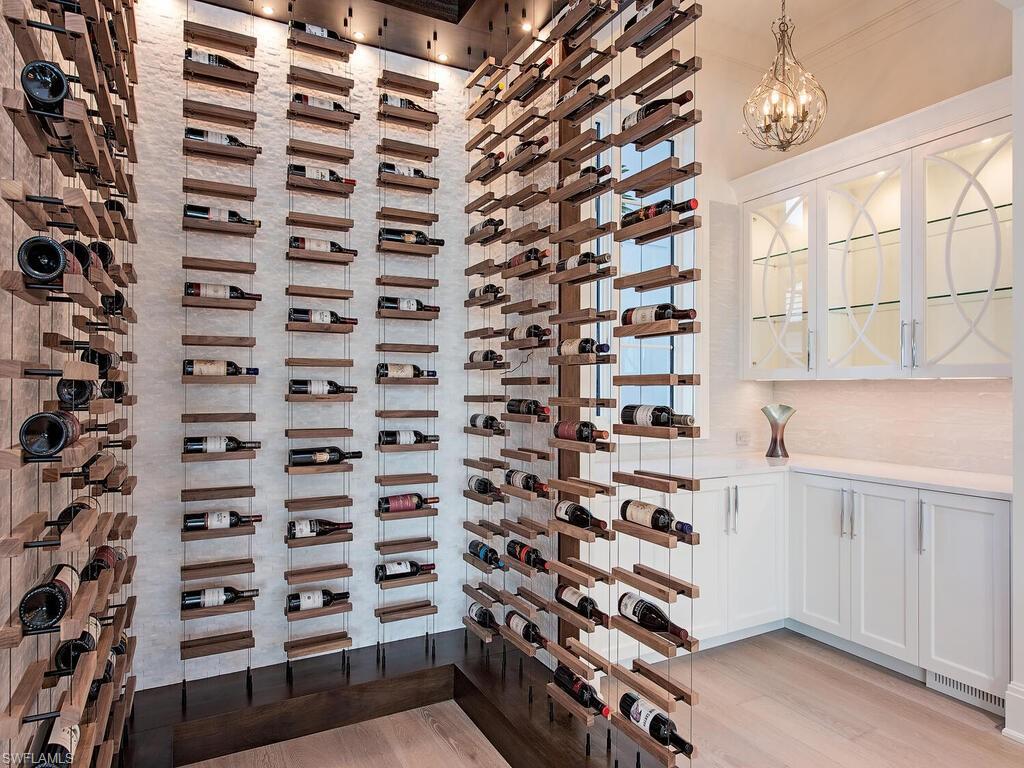 714 Killdeer Place Naples, FL 34108 - Photo 13 of 34 a view of a bathroom with a window