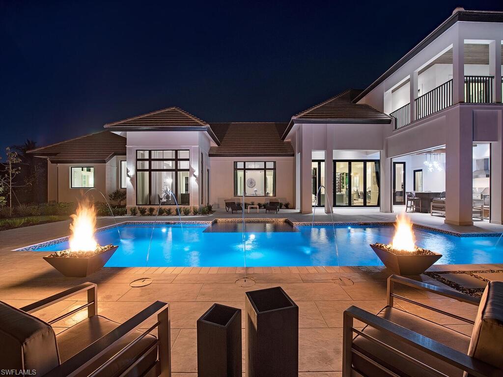 714 Killdeer Place Naples, FL 34108 - Photo 24 of 34 a view of a living room and dining room