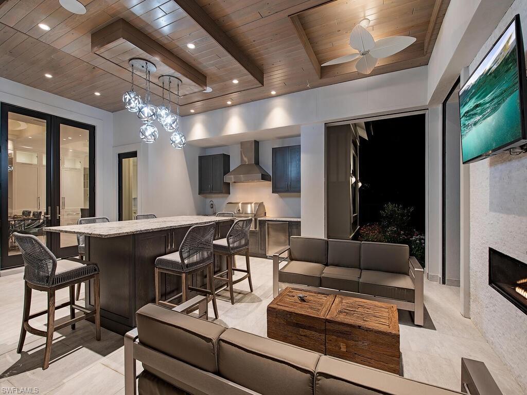 714 Killdeer Place Naples, FL 34108 - Photo 30 of 34 a view of a dining room with furniture window and outside view