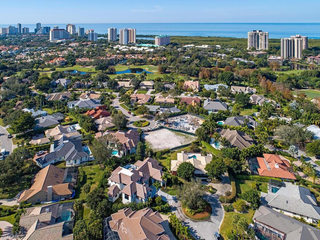 714 Killdeer Place Naples, FL 34108 - Photo 5 of 34 an aerial view of a city
