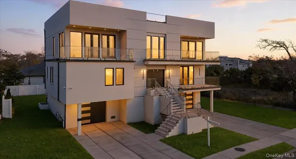 a front view of a house with yard