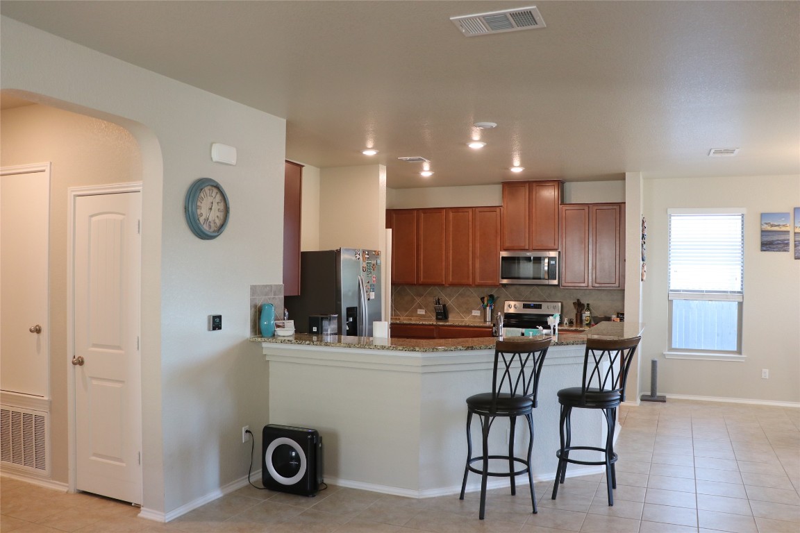 321 Parrot Tulip View Pflugerville, TX 78660 - Photo 12 of 33 a view of kitchen and sink