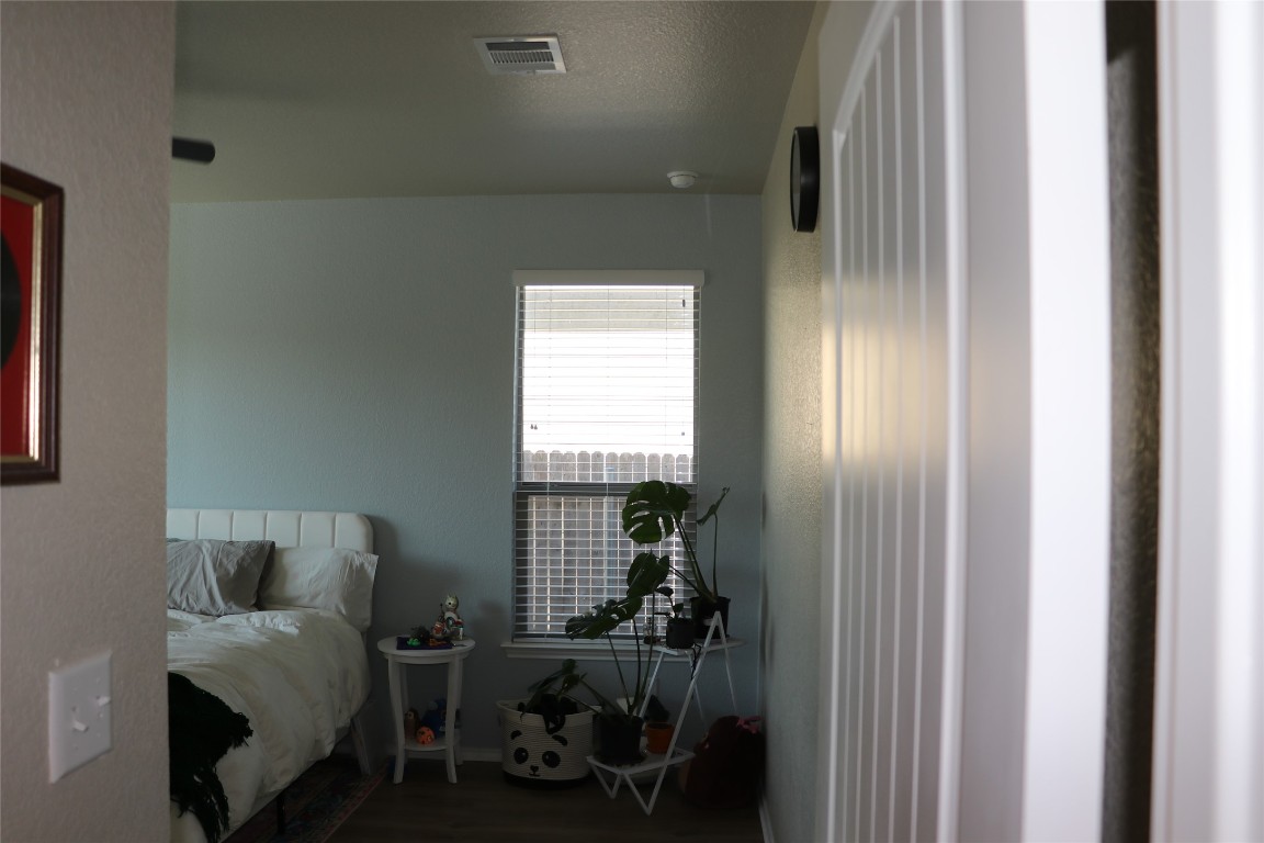 321 Parrot Tulip View Pflugerville, TX 78660 - Photo 21 of 33 a room with furniture and a window