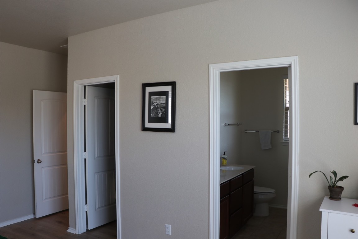 321 Parrot Tulip View Pflugerville, TX 78660 - Photo 24 of 33 a bathroom with a toilet