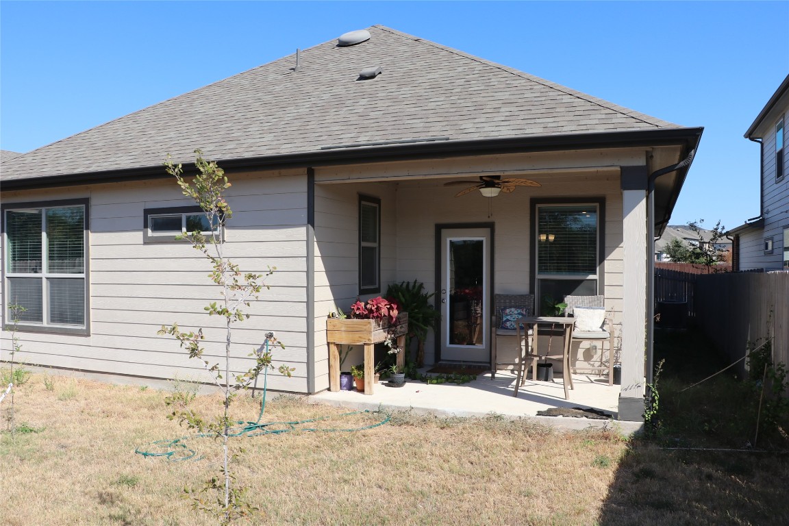321 Parrot Tulip View Pflugerville, TX 78660 - Photo 31 of 33 a front view of a house with a patio