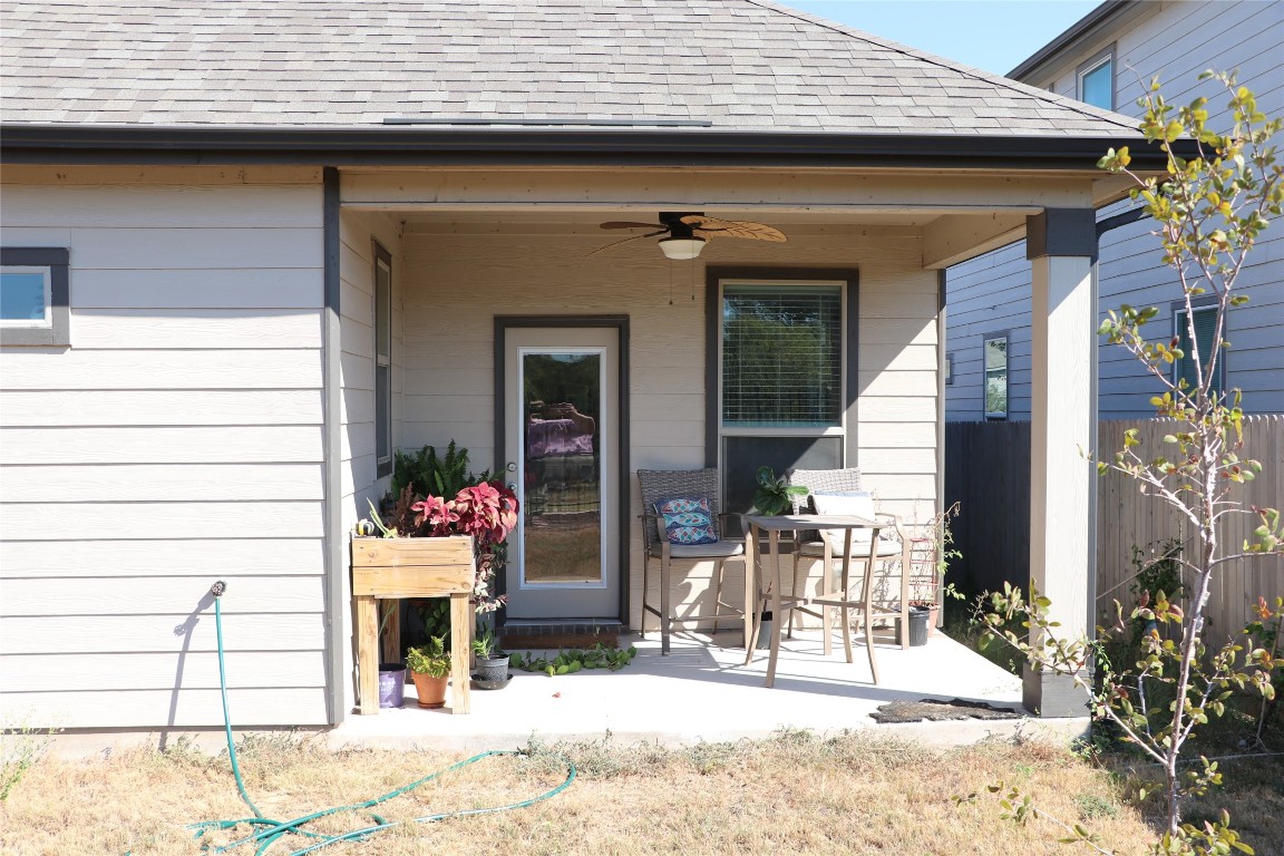 321 Parrot Tulip View Pflugerville, TX 78660 - Photo 32 of 33 a view of a dinning room with a patio