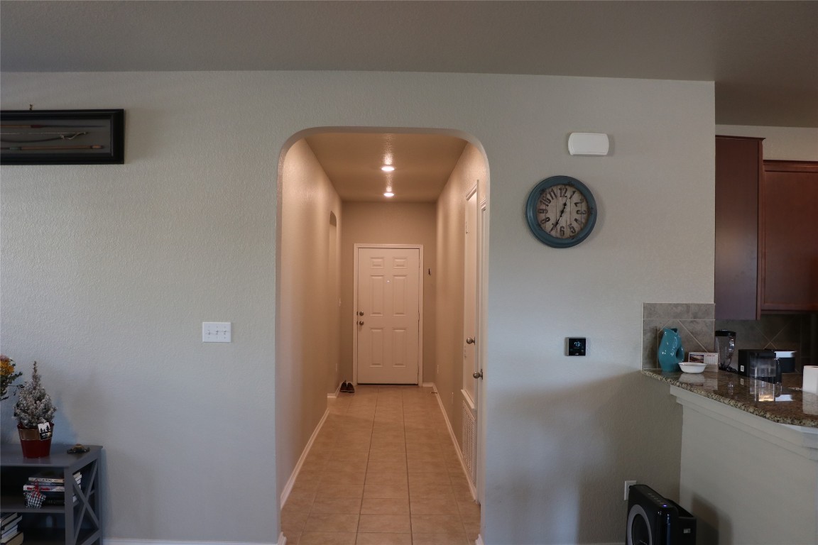 321 Parrot Tulip View Pflugerville, TX 78660 - Photo 9 of 33 a view of a livingroom with furniture and a fan
