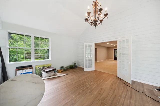 a bed room with a bed and a window