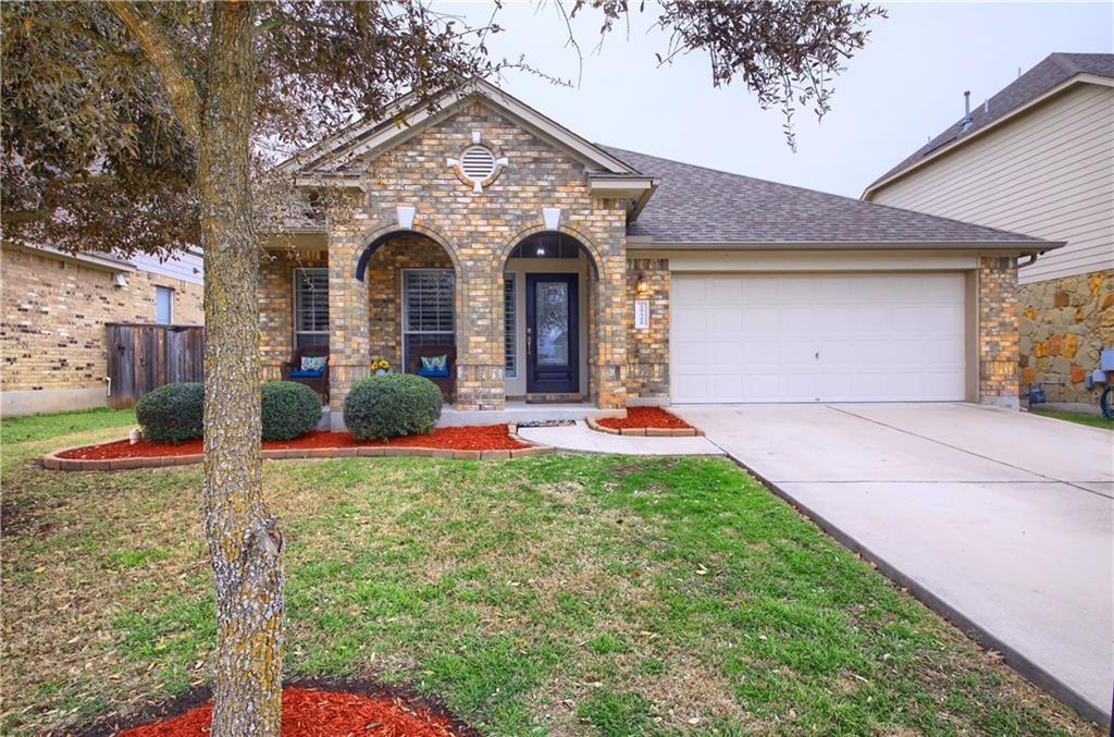 19516 Bridie Path Pflugerville, TX 78660 - Photo 1 of 1 a front view of a house with yard