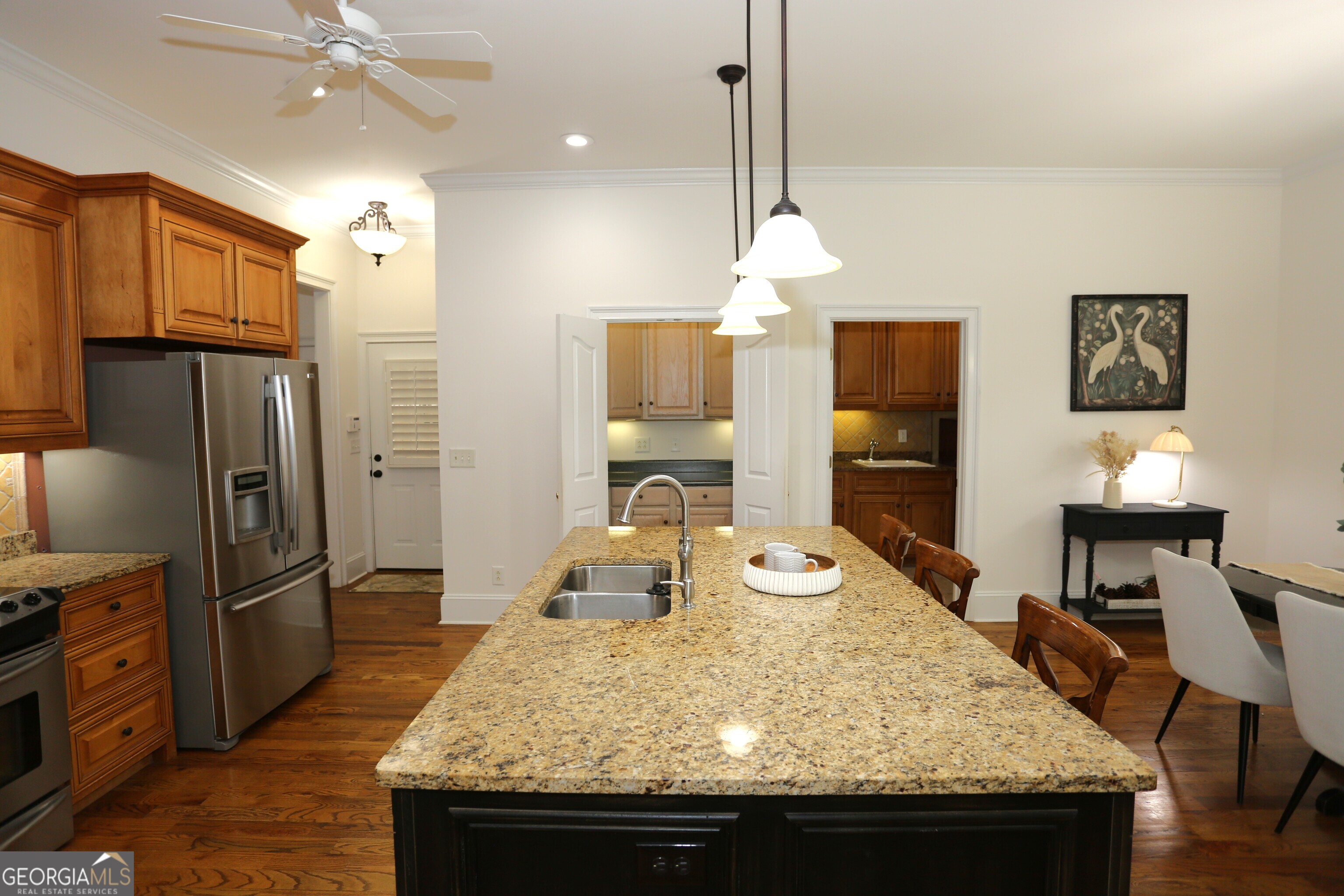 859 Tufthunter Macon, GA 31210 - Photo 17 of 94 a kitchen with stainless steel appliances granite countertop a sink a stove and a refrigerator