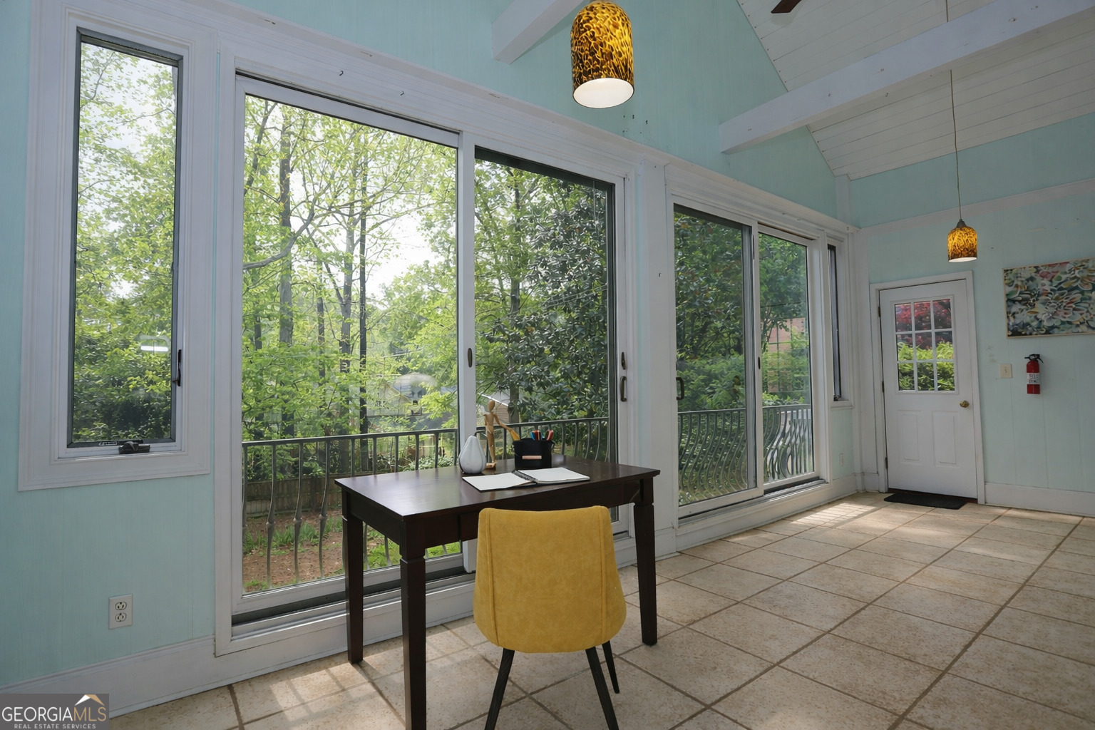 859 Tufthunter Macon, GA 31210 - Photo 29 of 94 a view of a livingroom with furniture wooden floor and a large window