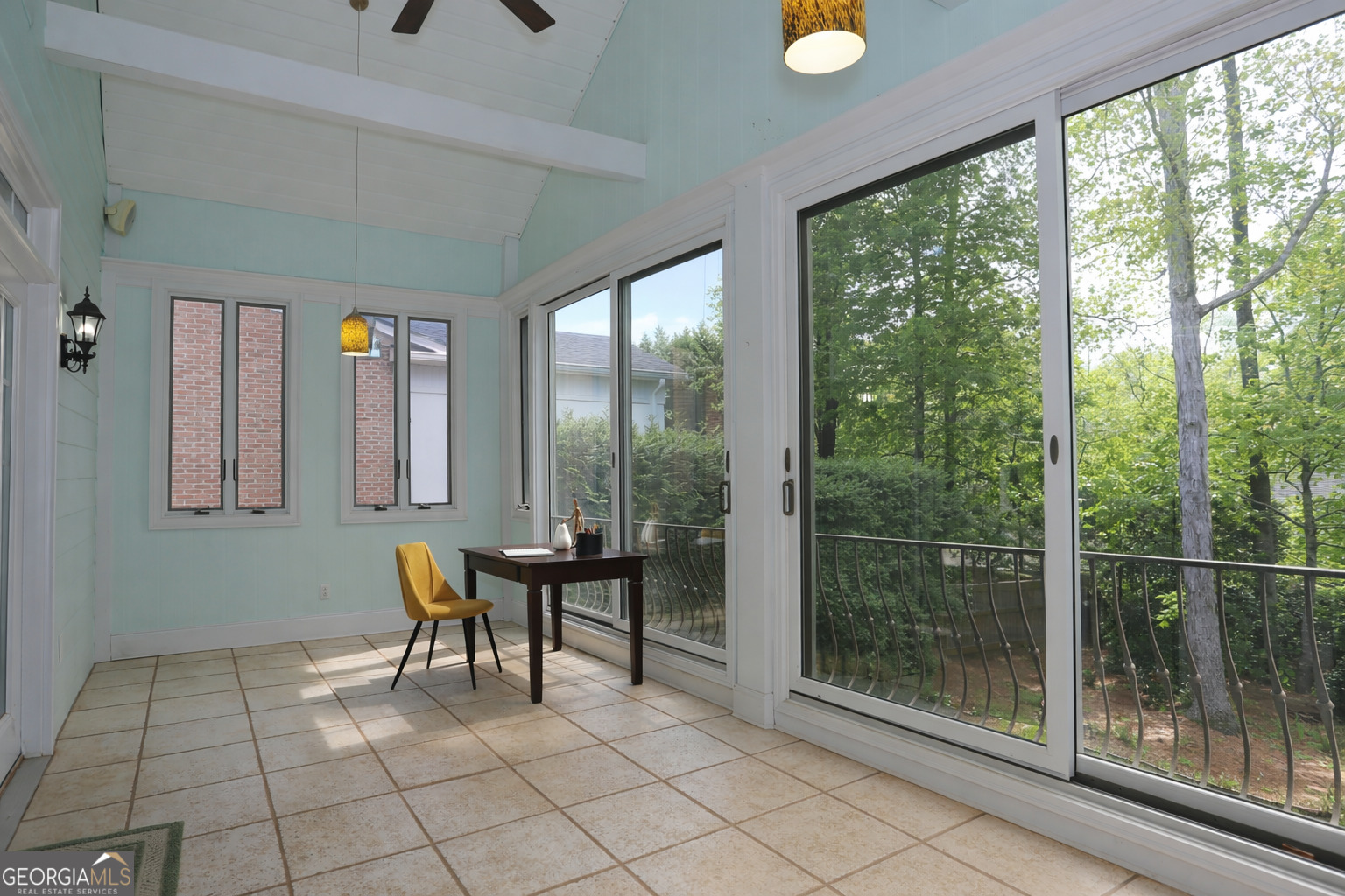 859 Tufthunter Macon, GA 31210 - Photo 30 of 94 a living room with furniture and a floor to ceiling window