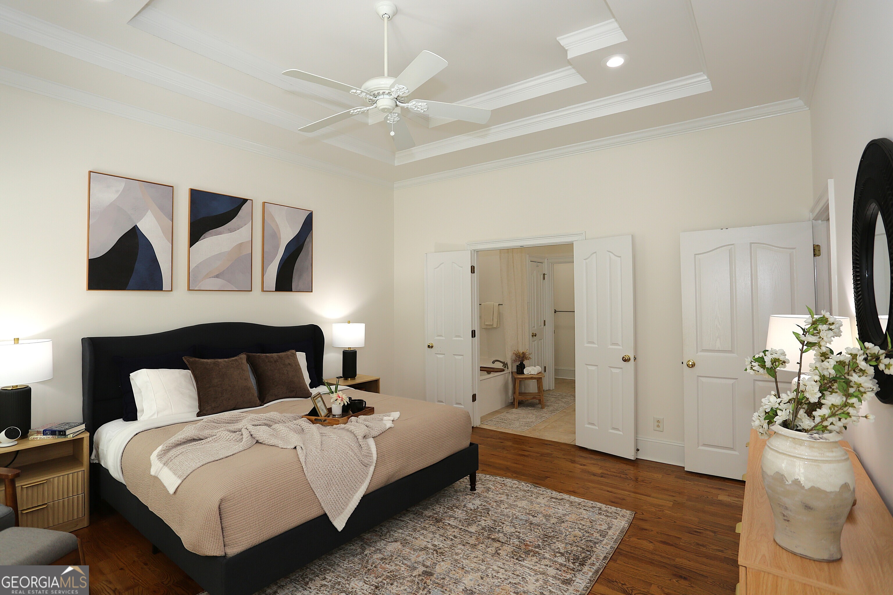 859 Tufthunter Macon, GA 31210 - Photo 34 of 94 a bedroom with a bed and wooden floor