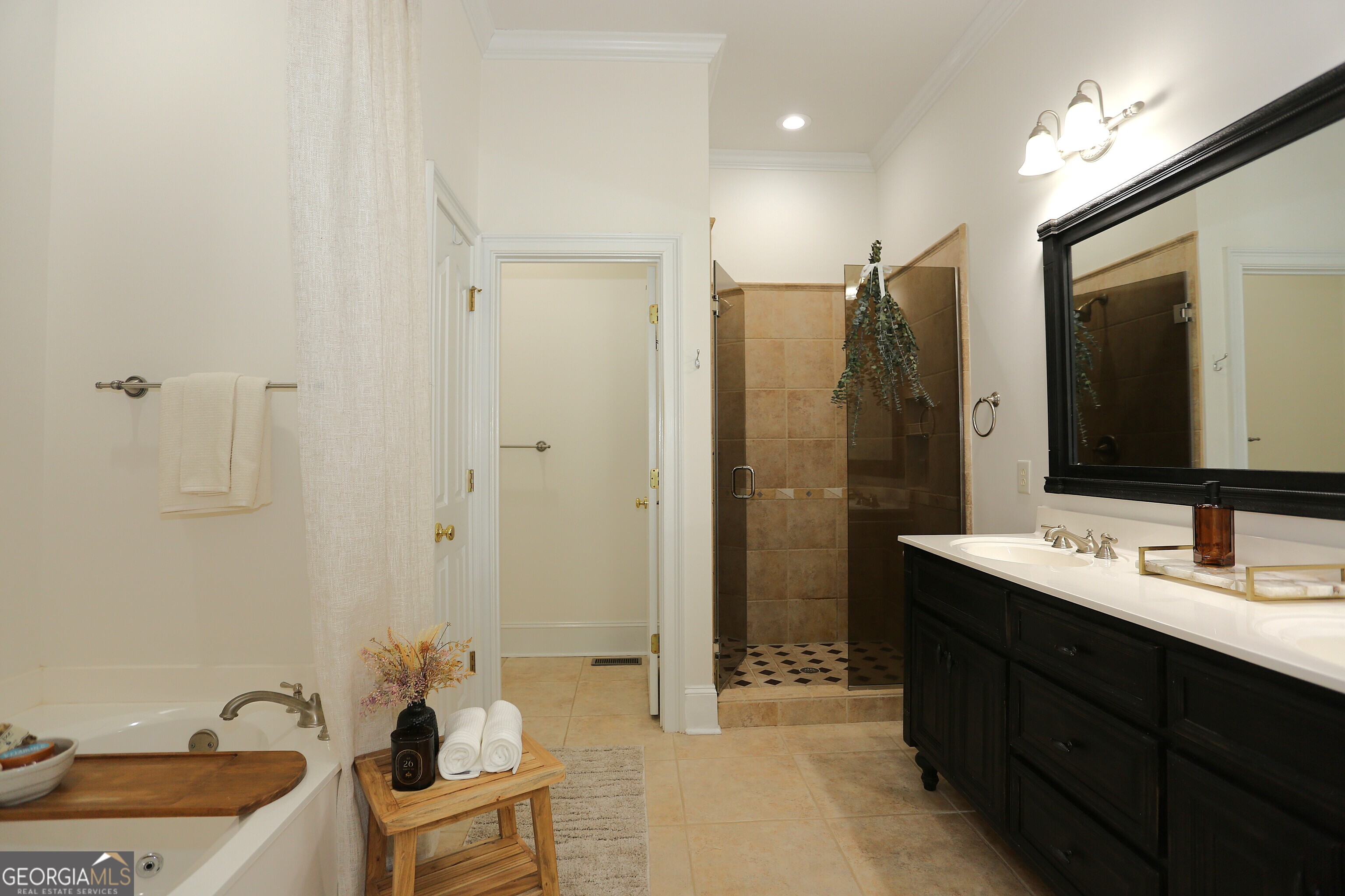 859 Tufthunter Macon, GA 31210 - Photo 35 of 94 a bathroom with a double vanity sink mirror and shower