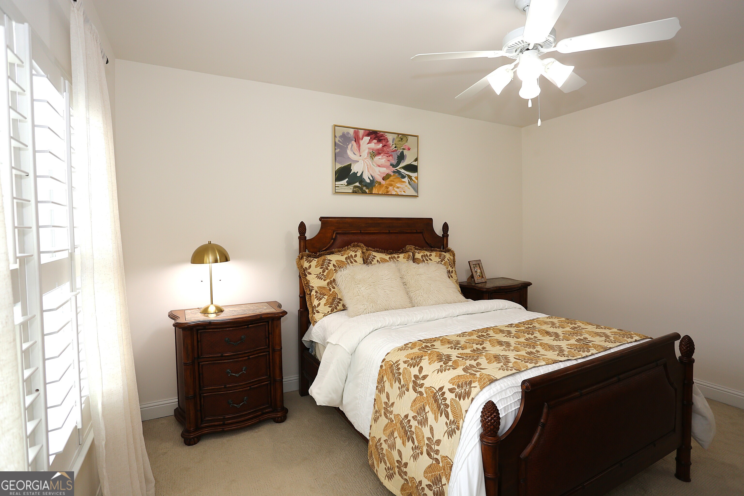 859 Tufthunter Macon, GA 31210 - Photo 45 of 94 a bedroom with a bed and a chandelier
