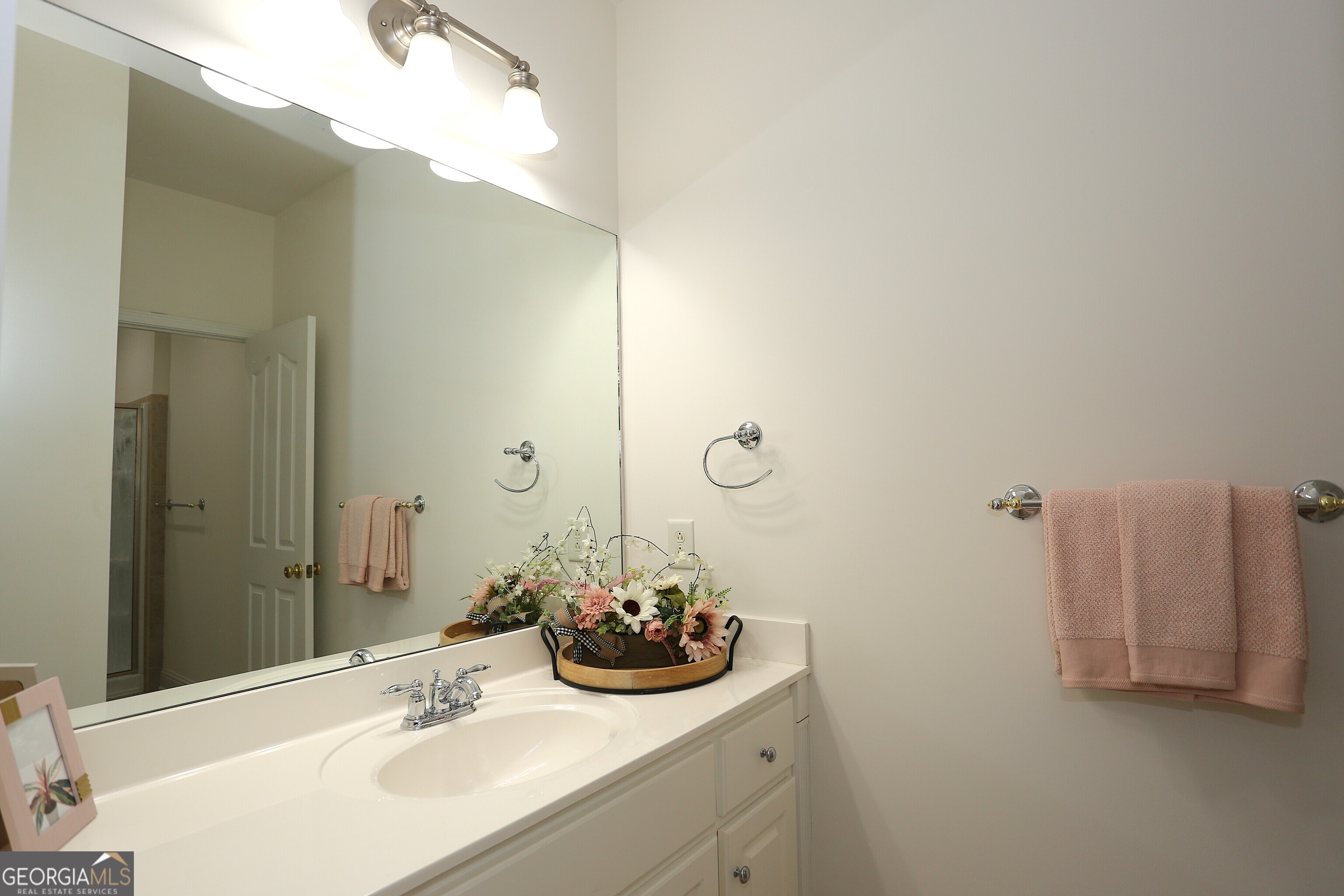 859 Tufthunter Macon, GA 31210 - Photo 47 of 94 a bathroom with a sink and a mirror
