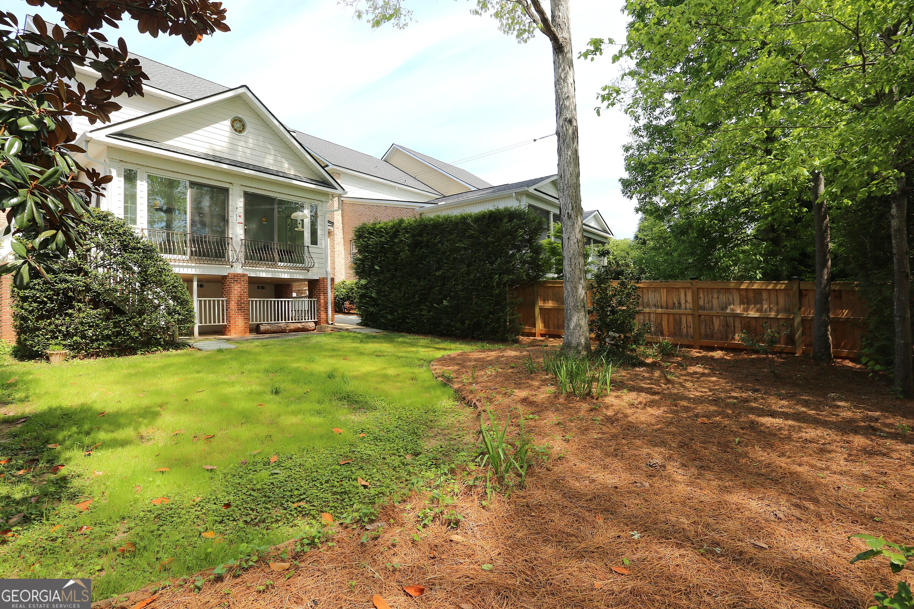 859 Tufthunter Macon, GA 31210 - Photo 85 of 94 front view of a house with a yard
