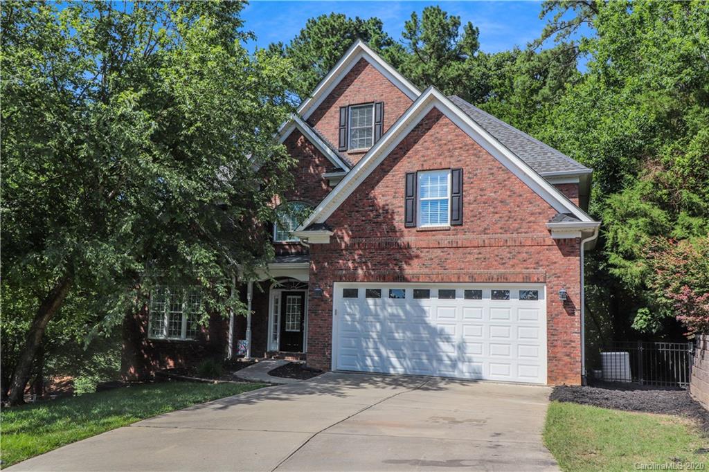11156 Turtle Bay Court Tega Cay, SC 29708 - Photo 22 of 22 a front view of a house with yard and trees