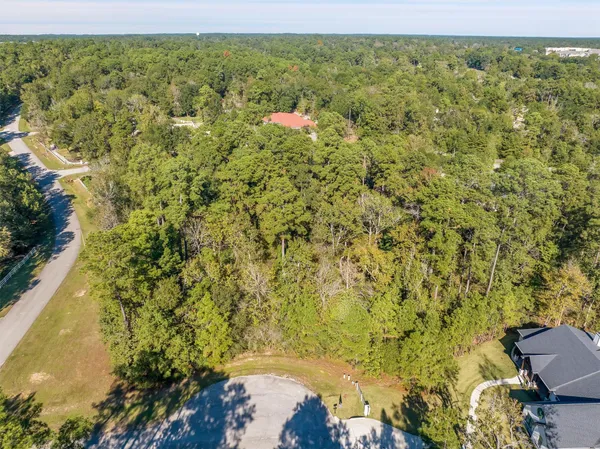 a view of a yard with an outdoor space and seating