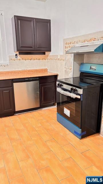 312 Hamilton Street, Unit 1 Harrison, NJ 07029 - Photo 13 of 16 a kitchen with granite countertop a stove and a sink