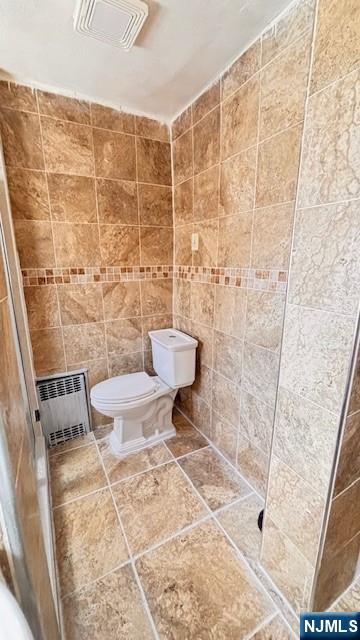 312 Hamilton Street, Unit 1 Harrison, NJ 07029 - Photo 15 of 16 a bathroom with a toilet and a shower