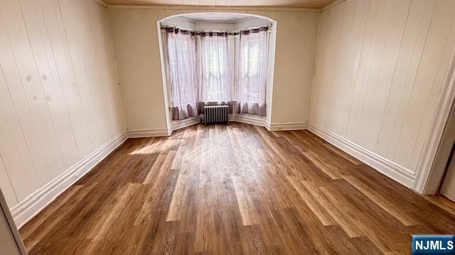 312 Hamilton Street, Unit 1 Harrison, NJ 07029 - Photo 2 of 16 a view of a room with wooden floor and fence