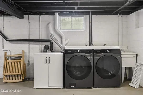a utility room with dryer and washer