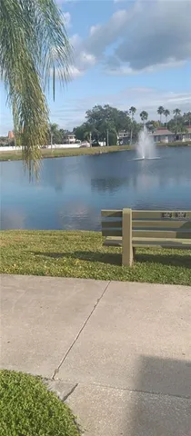 a view of outside space with a lake view