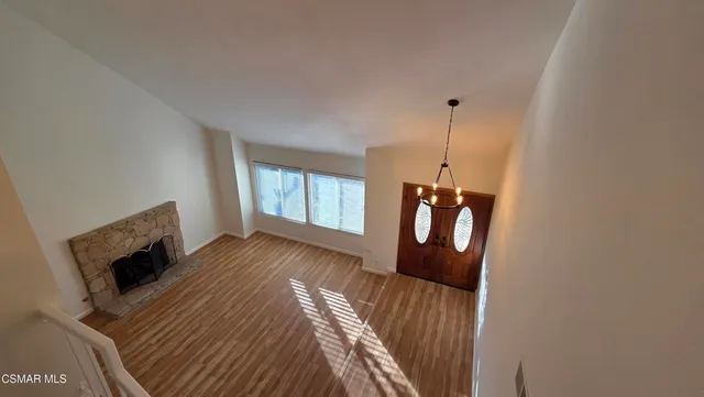 a view of a living room with furniture