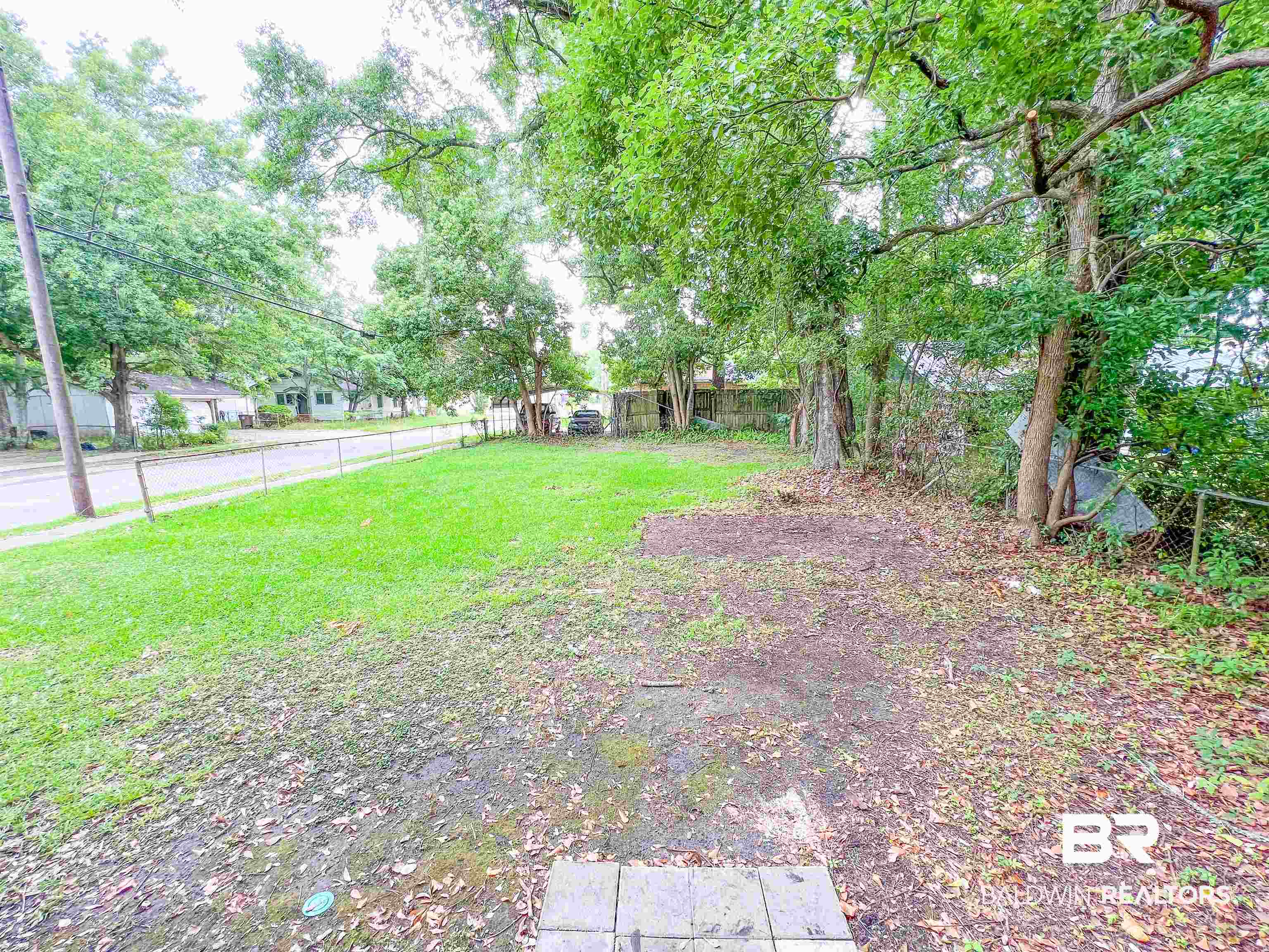 1164 Seneca Street Mobile, AL 36605 - Photo 20 of 22 View of yard featuring fence