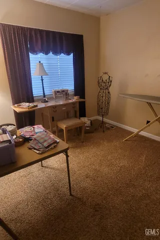 a living room with a couch and a table