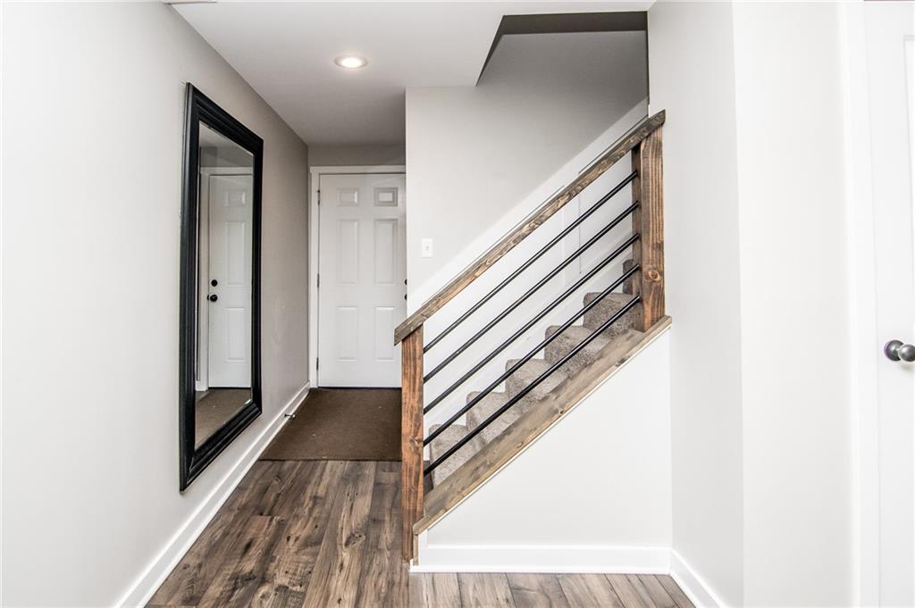 104 Bertley Ridge Drive Coraopolis, PA 15108 - Photo 20 of 25 a view of a hallway with wooden floor and entryway
