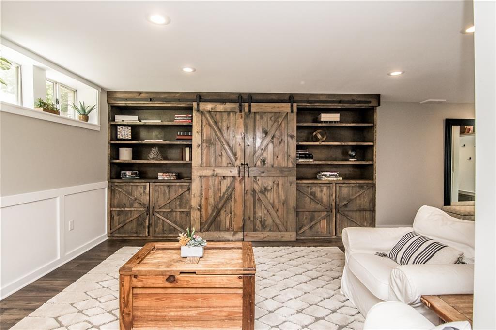 104 Bertley Ridge Drive Coraopolis, PA 15108 - Photo 22 of 25 a living room with stainless steel appliances kitchen island granite countertop a refrigerator and cabinets