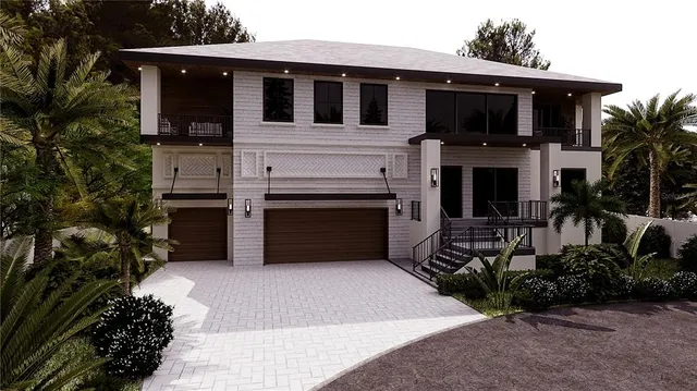 a view of a house with a yard and garage