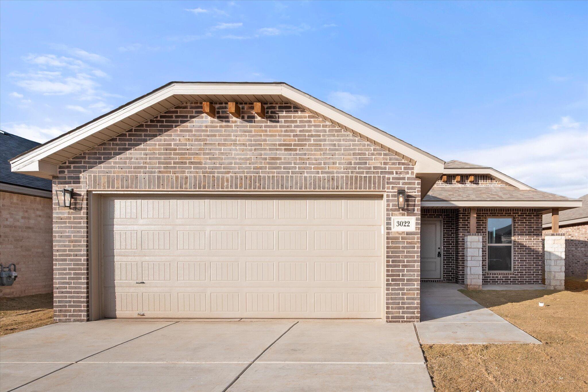a view of a house with garage