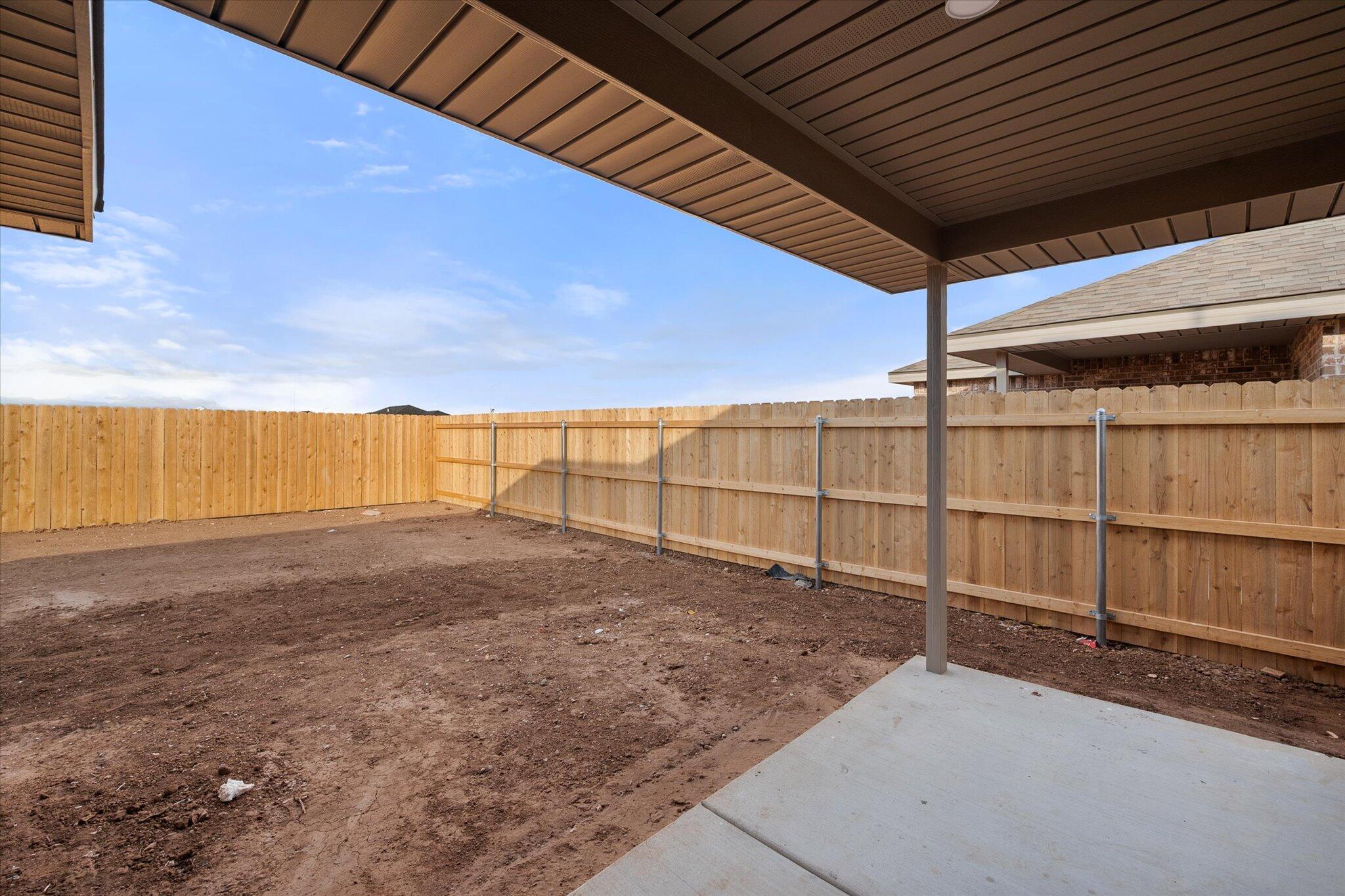3022 138th Place Lubbock, TX 79423 - Photo 20 of 20 a view of a backyard of the house