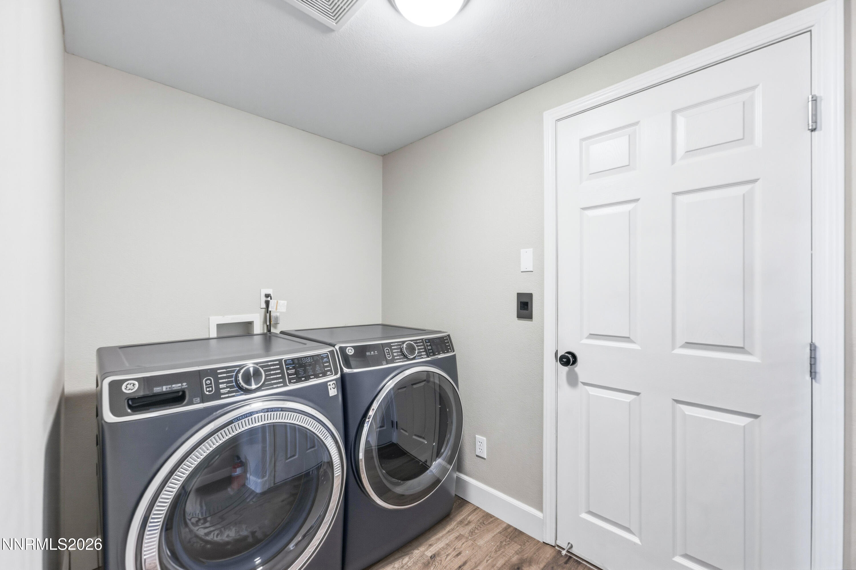 1770 Kodiak Circle Reno, NV 89511 - Photo 26 of 32 a view of storage and utility room with washer and dryer