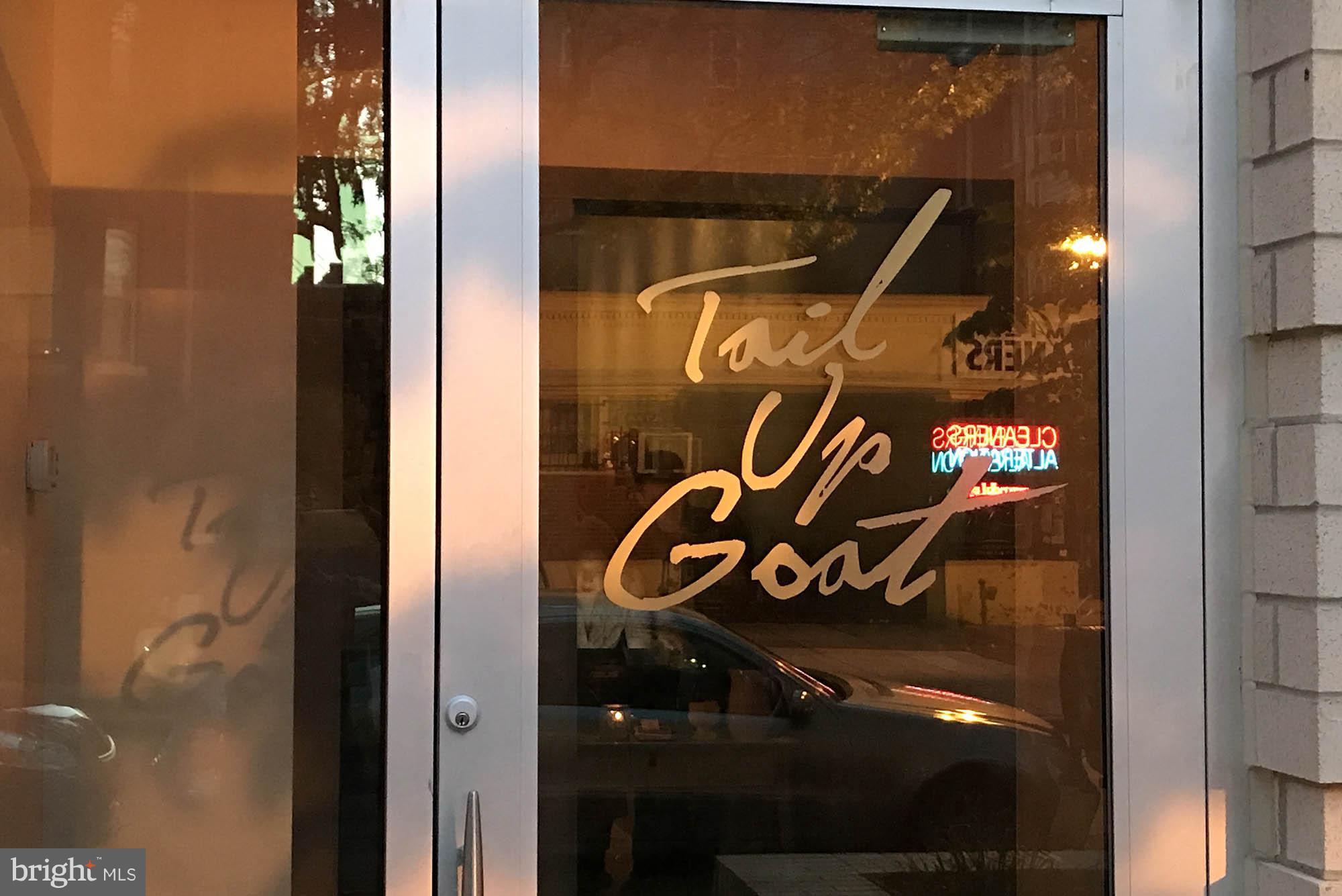 1851 Columbia Road Northwest, Unit 305 Washington, DC 20009 - Photo 20 of 28 a close up of a street sign