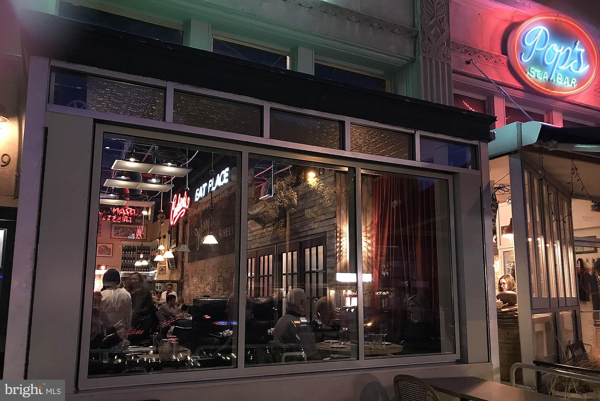 1851 Columbia Road Northwest, Unit 305 Washington, DC 20009 - Photo 21 of 28 a view of a building with a glass door