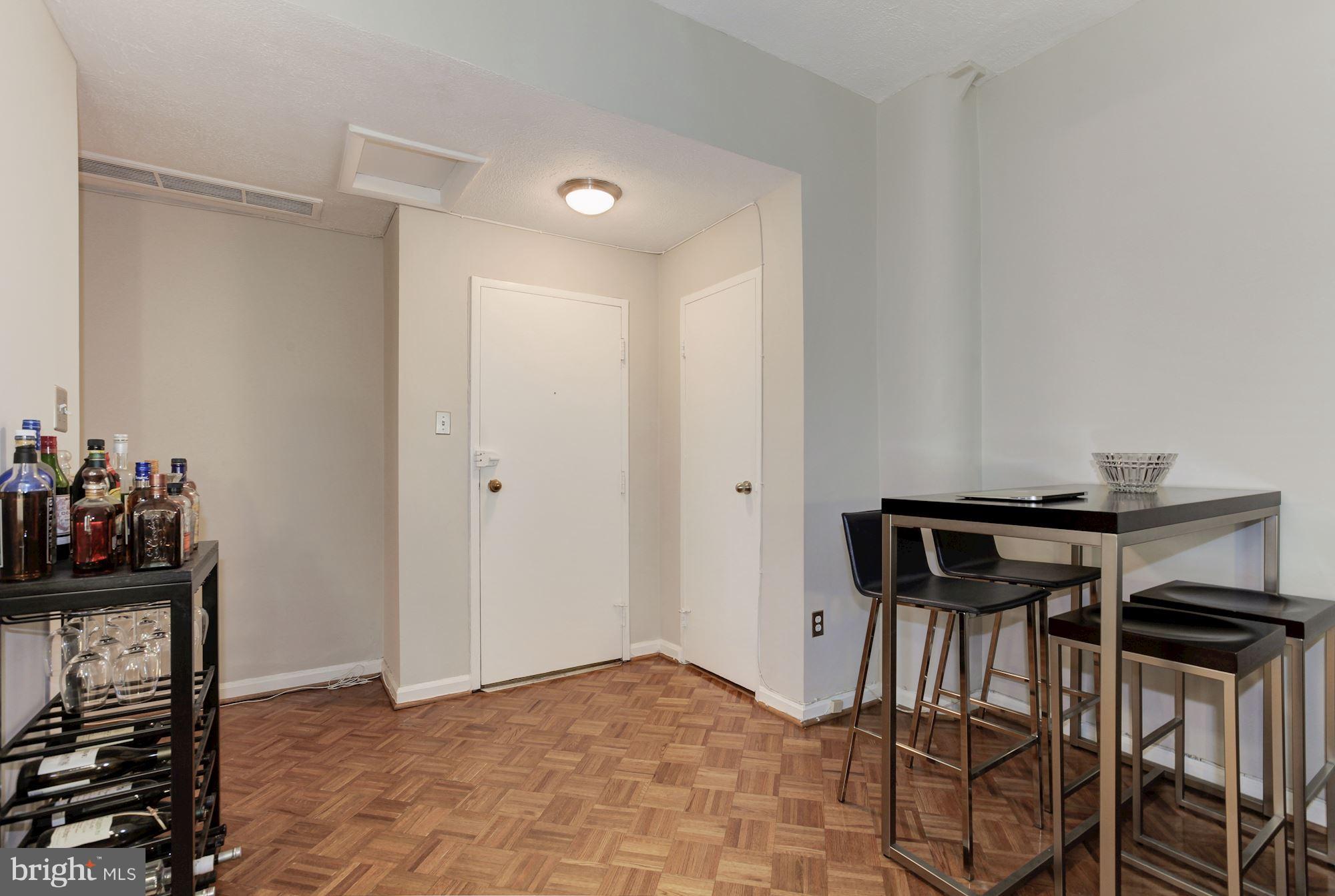 1851 Columbia Road Northwest, Unit 305 Washington, DC 20009 - Photo 8 of 28 a view of a workspace with furniture