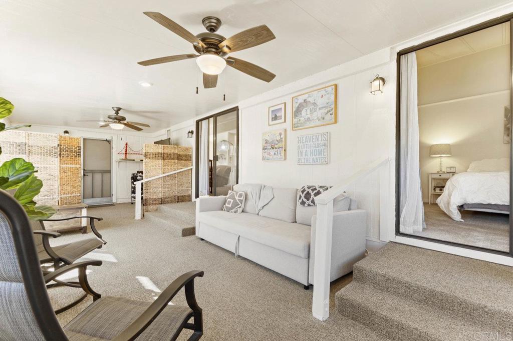 1476 Dover Street Oceanside, CA 92057 - Photo 20 of 45 a living room with furniture and a large window