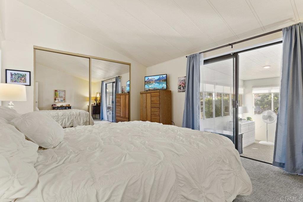 1476 Dover Street Oceanside, CA 92057 - Photo 22 of 45 a large white bed in a white room