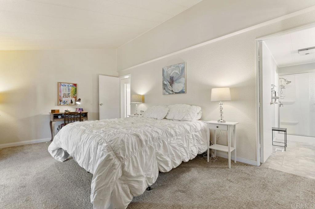 1476 Dover Street Oceanside, CA 92057 - Photo 23 of 45 a bed room with a bed and a night stand